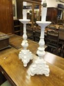A pair of white painted plaster table lamps in the 18th Century Italianate manner
