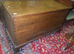 A 19th Century elm mule chest, raised on bracket supports   CONDITION REPORTS  Whilst the piece is