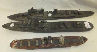Three wooden models of World War II ships, including T.S.S. Teucer, inscribed in pencil with names