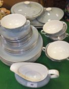 A collection of Royal Doulton "Forest Glade" pattern dinner wares to include two lidded tureens, two