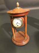 An early 20th Century mahogany cased portico clock, the eight day movement by HAC supported on