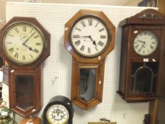 Three various wall clocks