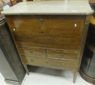 A Continental mahogany secretaire à abattant with grey marble top and two short and one long