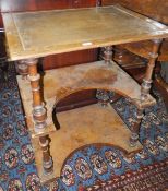 A Victorian walnut veneered three tier table / desk of whatnot form