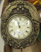 A gilt comtoise  wall clock with Arabic and Roman numerals to dial, the top edge decorated with