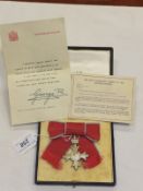 An MBE with citation, signed by George V, "Presented to Miss Iolanthe Wallis, Civil Division of