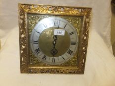 An early 20th Century French easel clock with carved giltwood frame, the eight day movement with