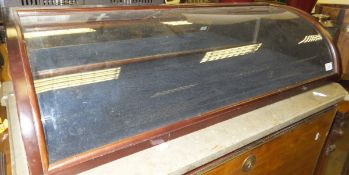 A mahogany dome top glazed table top display cabinet