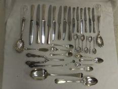 A box containing a George II Hanover pattern silver serving spoon (by Edward Pocock, London,