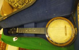A Jetel No. 8 ukulele banjo with carry case   CONDITION REPORTS  Total length approx. 56 cm.