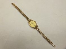 A ladies gold plated Longines quartz wristwatch