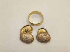 An 18 carat gold wedding band, and a pair of 9 carat gold cufflinks   CONDITION REPORTS  Total