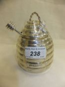 A modern silver honey pot of basket form with honey dripper (by Longford Silver Galleries,