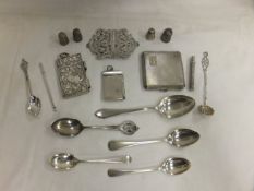 A quantity of silver and plated items to include notepad, nurse's buckle, various spoons, engine