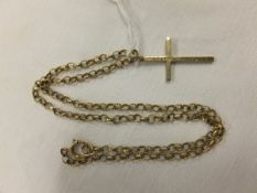 A 9 carat gold crucifix on chain   CONDITION REPORTS  Weight approx. 11 gms, cross is inscribed "