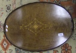 A 19th Century mahogany and inlaid oval galleried tray with brass handles and central floral