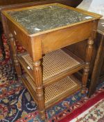 A 19th Century Continental mahogany three tier whatnot/occasional table with marbled top and