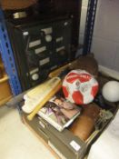 A box of assorted sporting related items to include binoculars, tie pins, cameras, signed Swindon