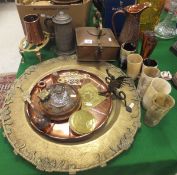 A square bodied copper range kettle, a brass trivet, large brass tray decorated in the Oriental