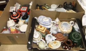 Three boxes of assorted novelty and other teapots