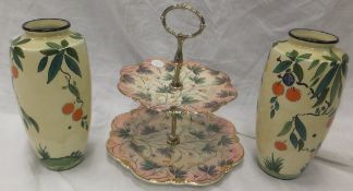 A pair of Falconware vases, and a Royal Winton two tier cake stand