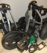 A Hillbilly powered golf trolley and two Hawk powered golf trollies, plus three golf clubs to