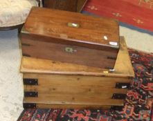 A 19th Century mahogany writing box with brass mounts and a small pine trunk