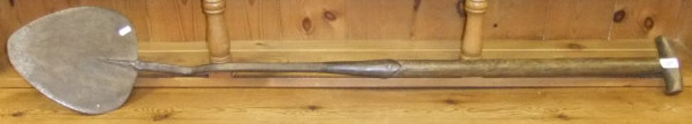 A vintage turf spade, the wooden handle inscribed "CB & S", the wrought iron blade stamped "Elwell"