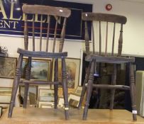 A set of twelve beech and elm stained stick back kitchen chairs