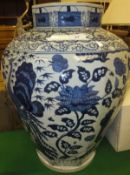 A modern Chinese octagonal baluster shaped vase with exotic bird panel decoration