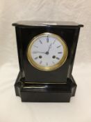 A circa 1900 French black lacquered cased mantel clock, the eight day movement with circular