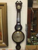 A 19th Century mahogany and inlaid barometer thermometer by J Schalfino, Taunton