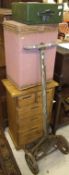 A small modern pine chest of two short and three long drawers, a Lloyd Loom style linen basket, a