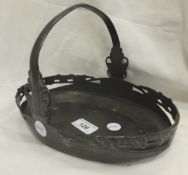 A Liberty & Co., design No. 0359 1904 pewter Arts and Crafts basket