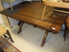 A 20th Century oak refectory style table on X end supports united by a central stretcher   CONDITION