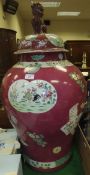 A Chinese porcelain floor vase and cover decorated with cockerels amongst flowers and foliage,