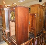 An Edwardian mahogany and inlaid pot cupboard and three various music cabinets, together with