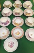 A collection of 19th Century English pottery cups and saucers, some transfer decorated in puce and