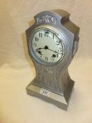 A late 19th American silver painted metal cased mantel clock, the eight day movement by The