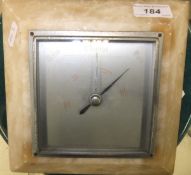 An early 20th Century aneroid barometer by Shortland Smiths, the square silvered dial within a