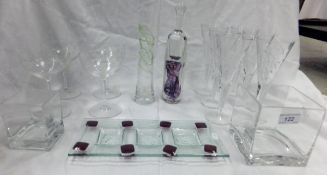 A signed glass scent bottle with amethyst and white coloured swirled pattern, a set of six wine