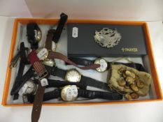 A box of assorted wristwatches, together with a bottle tag inscribed "Rum", a compass, a Parker