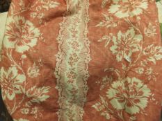 A pair of cotton interlined curtains, the red ground with foliate pattern, together with matching