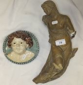 A 19th Century terracotta Classical figure (a/f), together with a relief decorated majolica wall