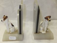 A pair of Royal Doulton Art Deco marble bookends with pottery terrier dog decoration   CONDITION