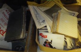 Three boxes containing albums of black and white photographs, copies of The Daily Mirror dating from