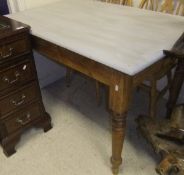 A rectangular pine kitchen table, the painted top above turned and ringed supports