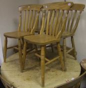 A set of eight modern beech slat back kitchen chairs