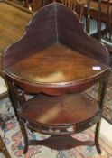 A late George III mahogany corner wash stand with bowl recess over a single drawer to splayed