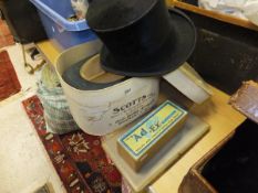 A Scott & Co. silk top hat of pepper pot shape, size 6½, together with a further silk top hat,